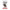 Magic: The Gathering Assassin’s Creed Beyond Booster featuring a hooded assassin in black and red on a white background